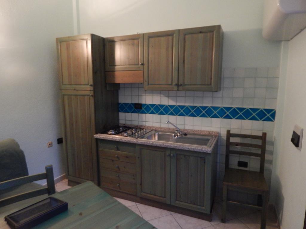 Appartamento Magnolia Cala Liberotto Habitación foto