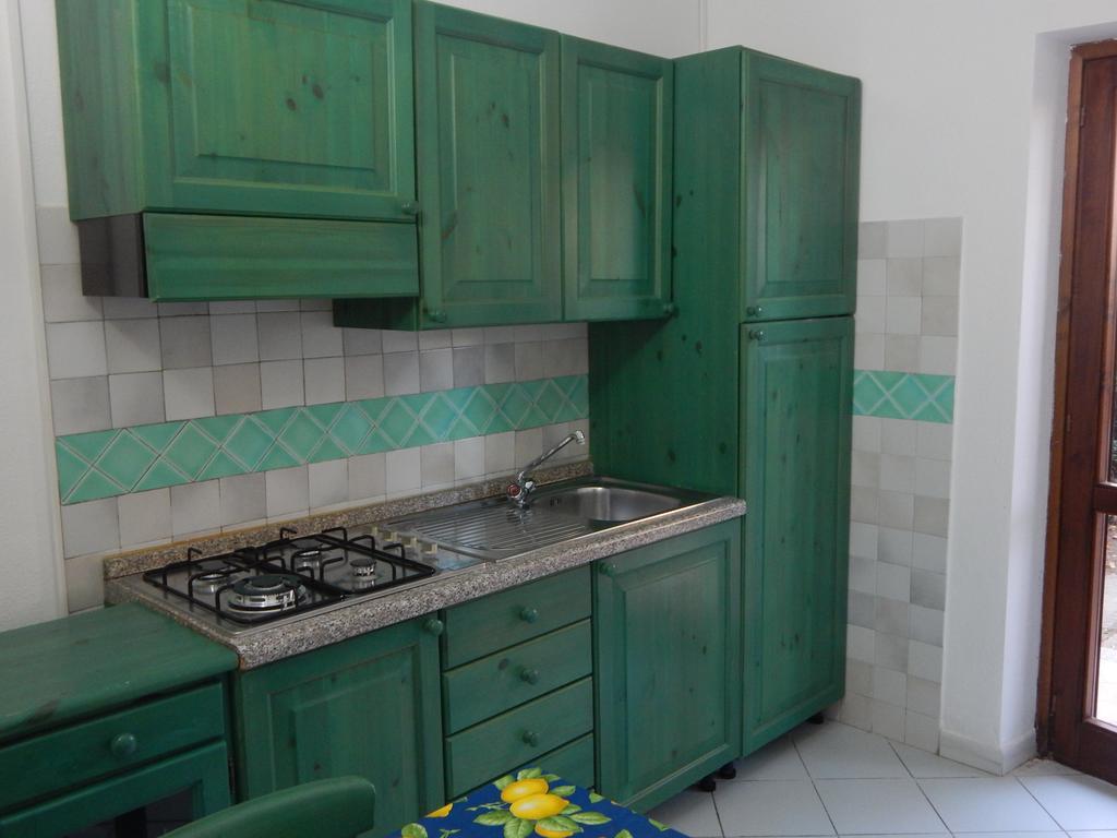 Appartamento Magnolia Cala Liberotto Habitación foto
