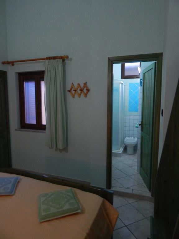 Appartamento Magnolia Cala Liberotto Habitación foto